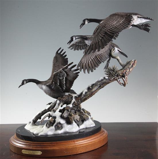 Frank Divita (b.1949) Graceful Descent. A cold painted bronze group of three Canada geese, height overall 19.5in.